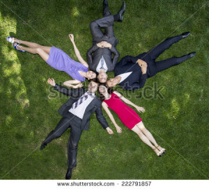 stock-photo-lunch-break-five-business-people-are-relaxing-on-the-glade-of-grass-during-lunch-time-happy-faces-222791857